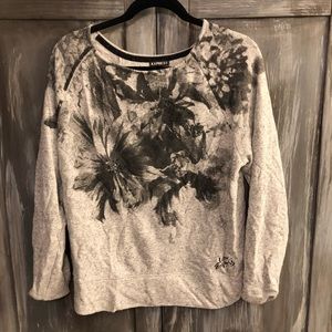 Gray sweater with black design